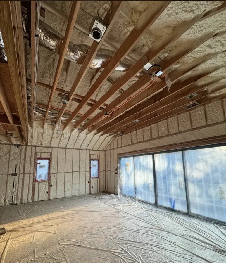 Interior walls and ceiling insulated with spray foam during new construction in San Leon